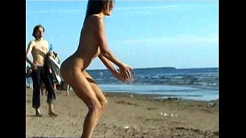 this teenie naturist undresses nude at a public beach